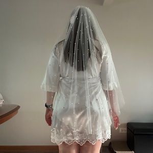 Ivory fingertip length veil with pearls